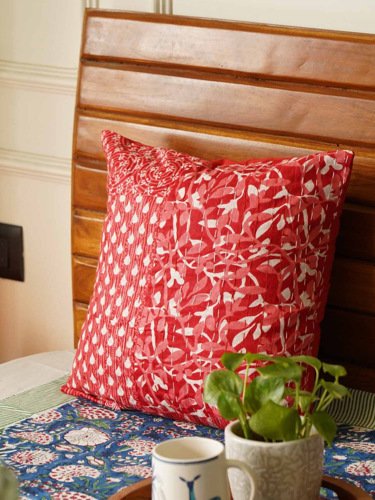 Laal-kantha cushion cover